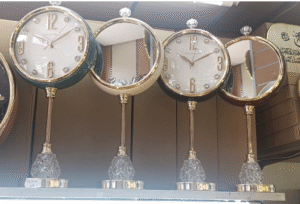 Reflet d’Or Horloge miroir double face – Collection Élégance